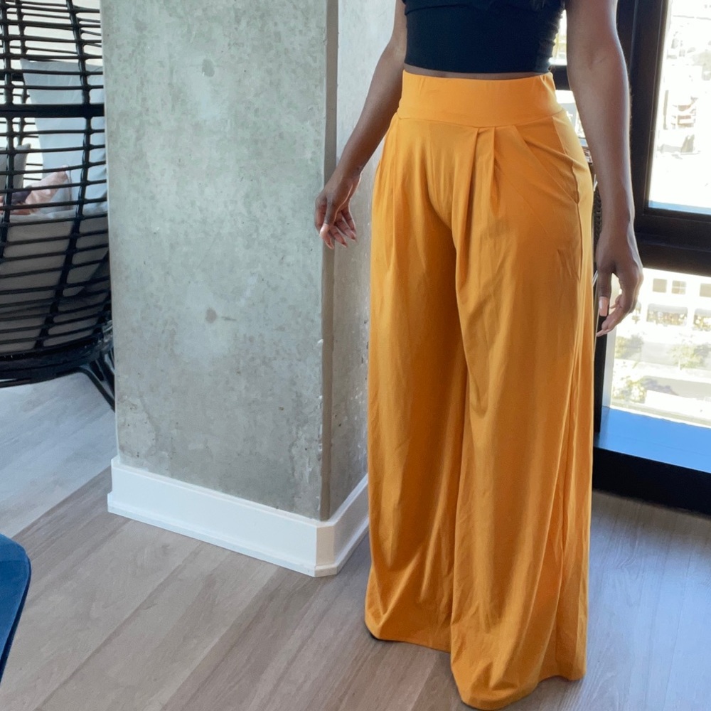 Yellow/gold, wide leg pants. Soft and comfortable, can be dressed up or down.